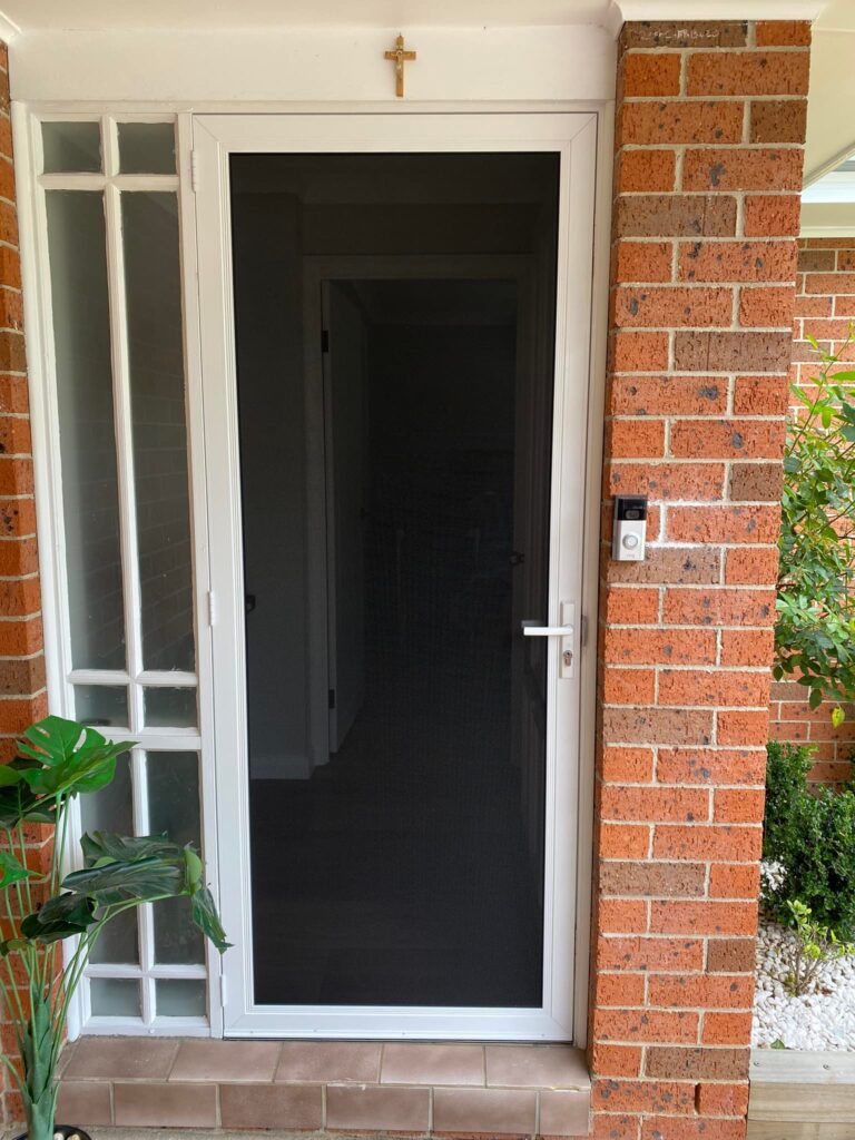 ScreenGuard ScreenGuard security screen door on front entrance installed by Olsen Security