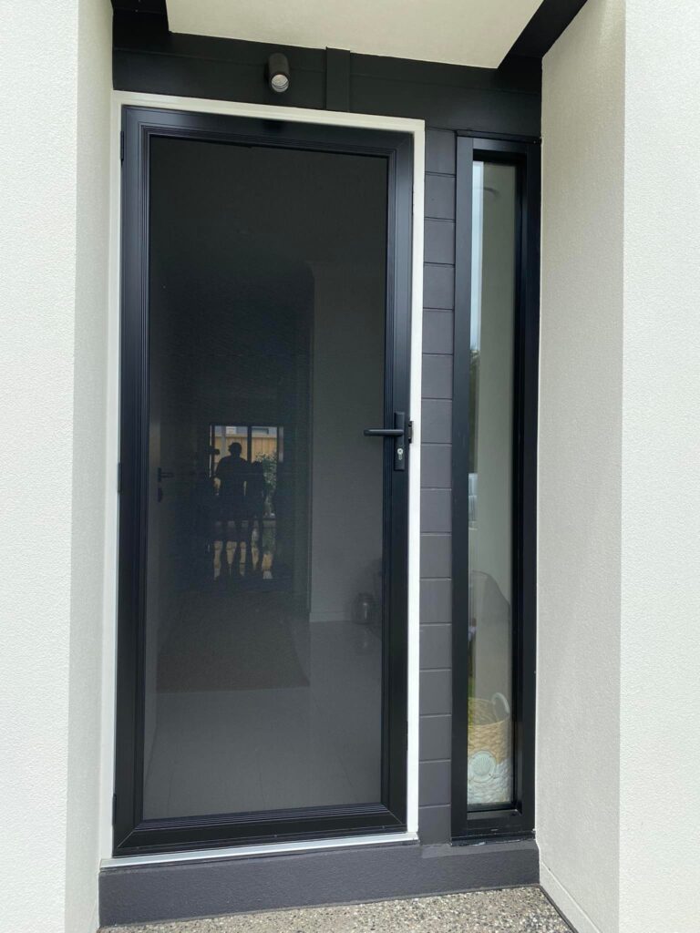 ScreenGuard ScreenGuard security screen door on front entrance and sidelight installed by Olsen Security