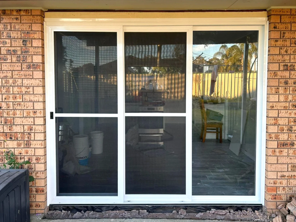 Our Projects Heavy-duty security mesh sliding doors on sliding doors installed by Olsen Security