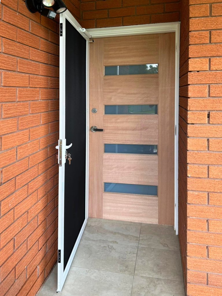 ScreenGuard security screen door on timber entrance door installed by Olsen Security