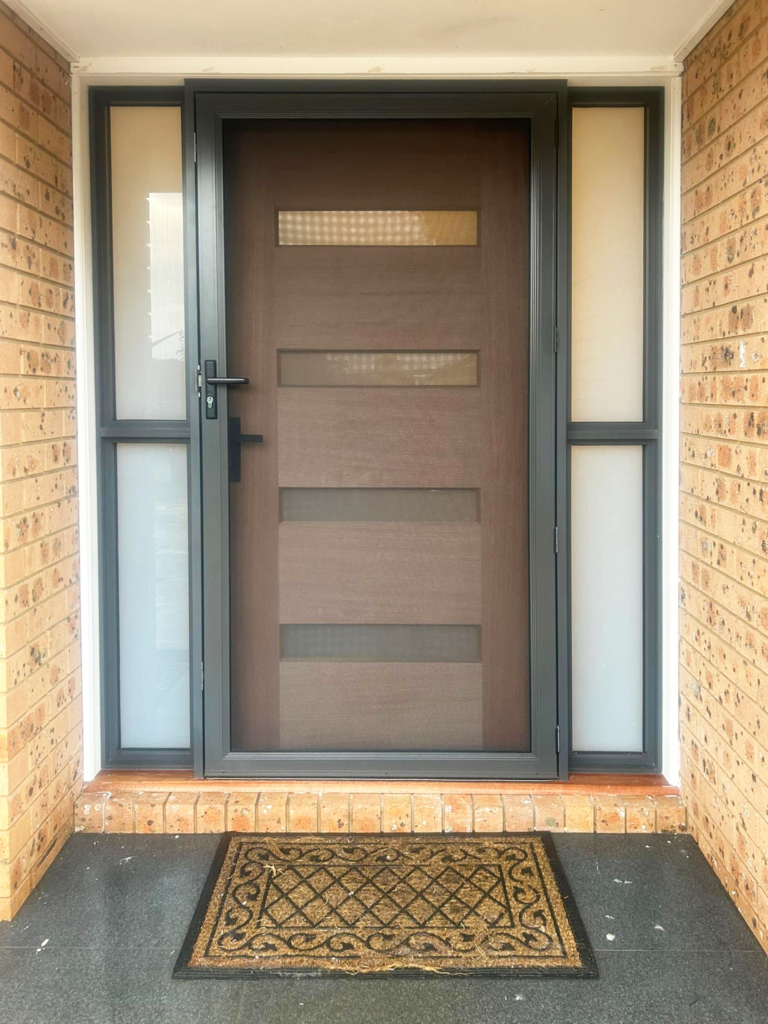 ScreenGuard security screen door on timber entrance door with sidelights installed by Olsen Security