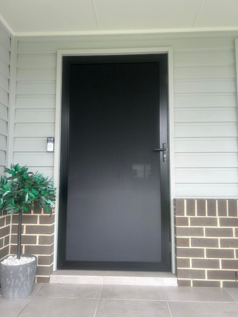 Heavy-duty security mesh door installed by Olsen Security