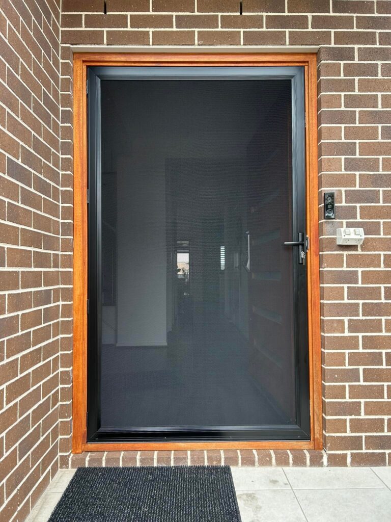 Heavy-duty security mesh door installed by Olsen Security