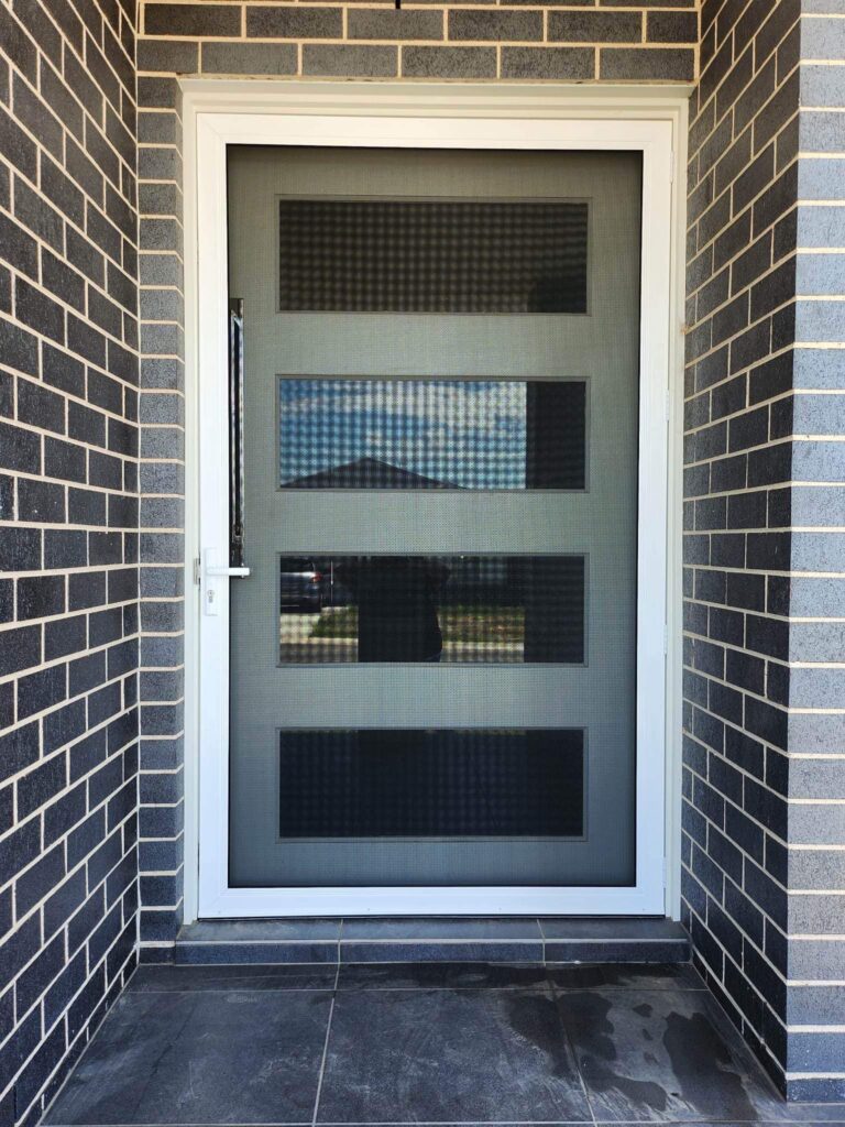 Heavy-duty security mesh door installed by Olsen Security