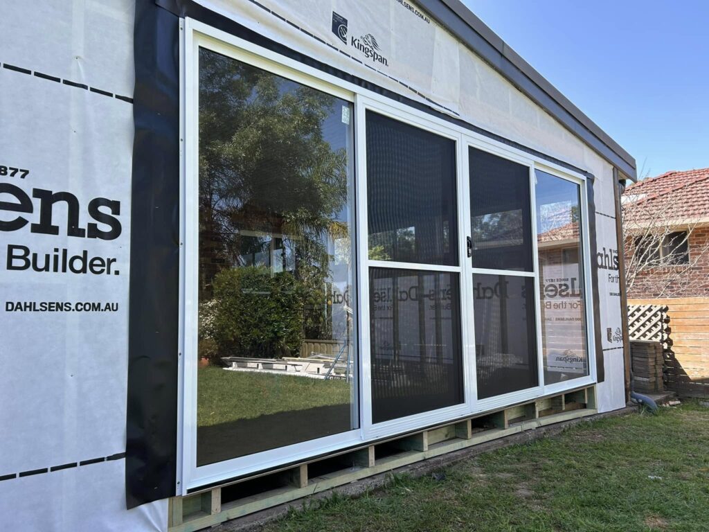 JDS Construction & Design - Klassicview sliding doors with heavy-duty flyscreen doors installed by Olsen Security