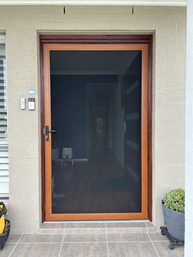 ScreenGuard ScreenGuard security screen door on front entrance installed by Olsen Security