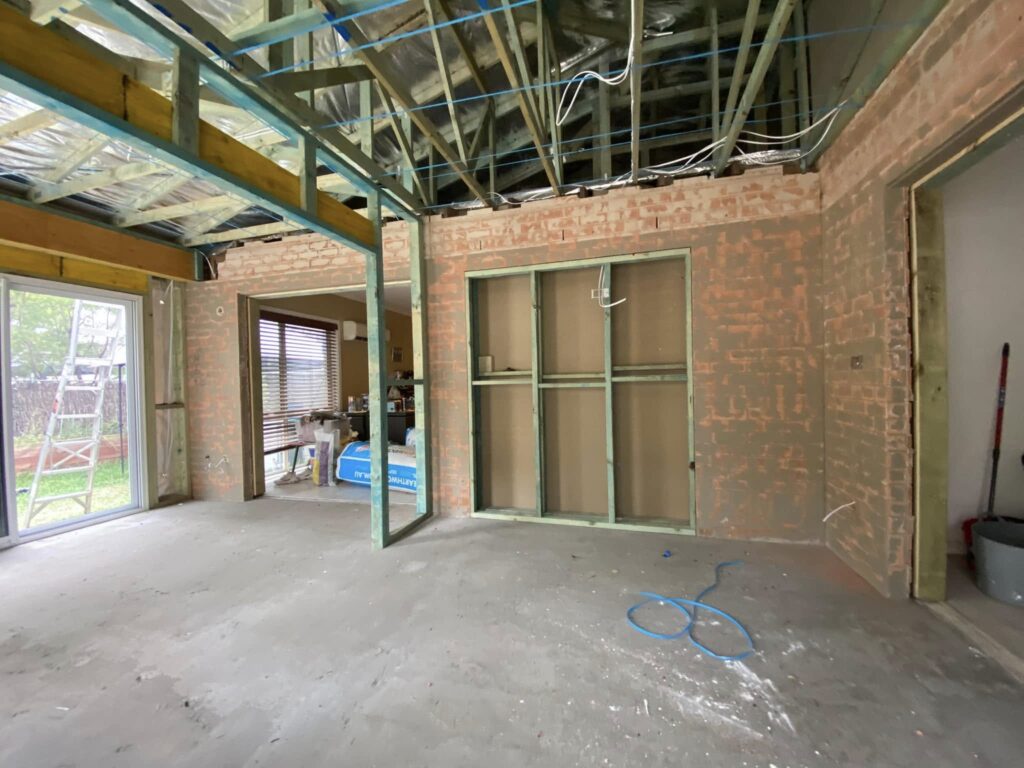 JDS Construction & Design - ScreenGuard security sliding doors on sliding doors opening to outdoor area, and ScreenGuard security mesh on awning windows installed by Olsen Security