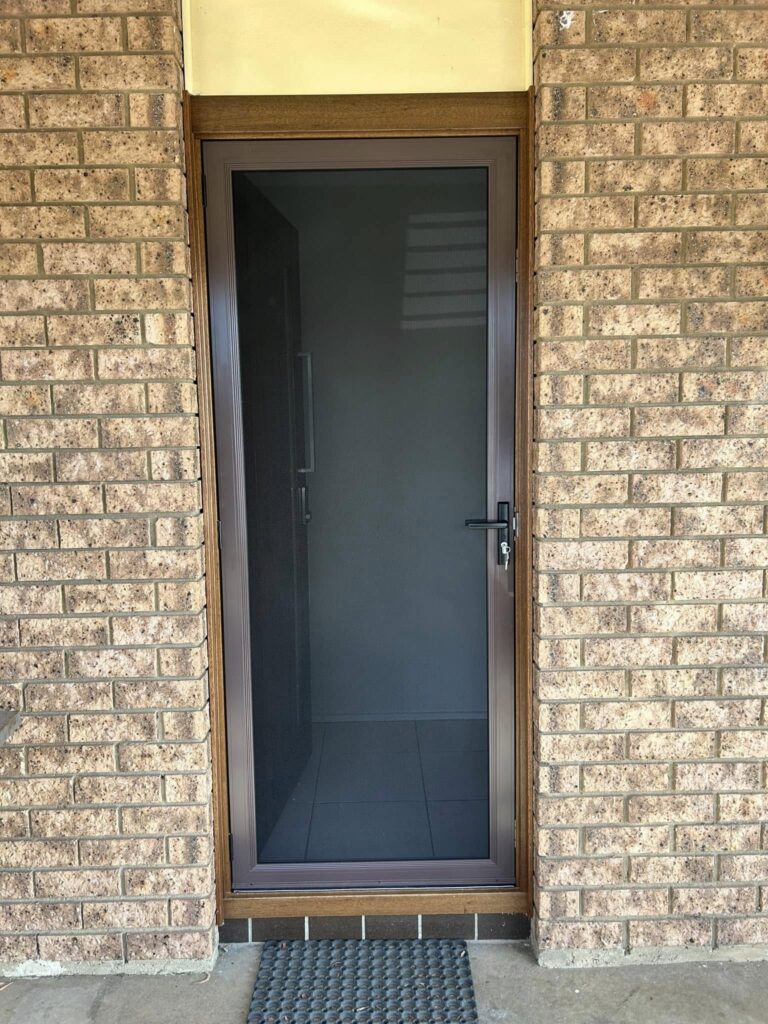 ScreenGuard ScreenGuard security screen door on front entrance installed by Olsen Security