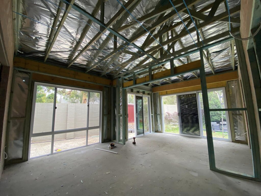 JDS Construction & Design - ScreenGuard security sliding doors on sliding doors opening to outdoor area, and ScreenGuard security mesh on awning windows installed by Olsen Security