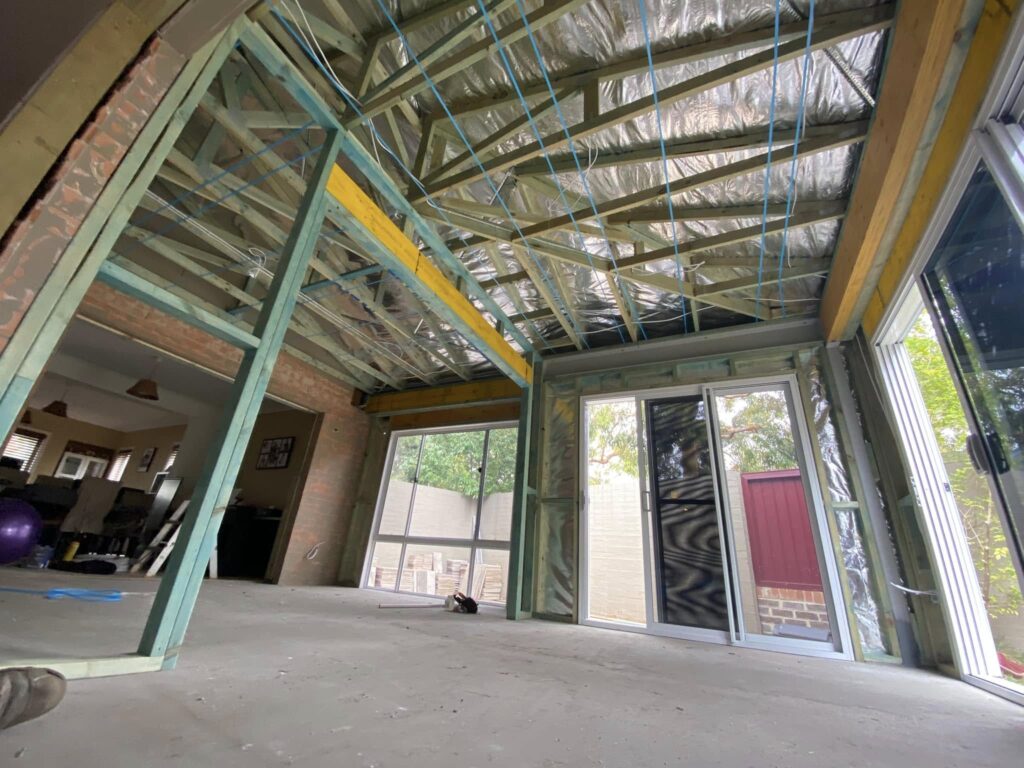 JDS Construction & Design - ScreenGuard security sliding doors on sliding doors opening to outdoor area, and ScreenGuard security mesh on awning windows installed by Olsen Security