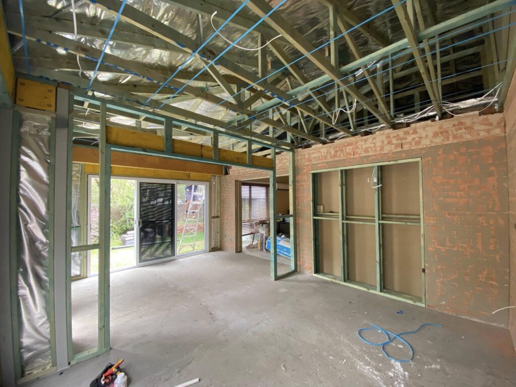 JDS Construction & Design - ScreenGuard security sliding doors on sliding doors opening to outdoor area, and ScreenGuard security mesh on awning windows installed by Olsen Security