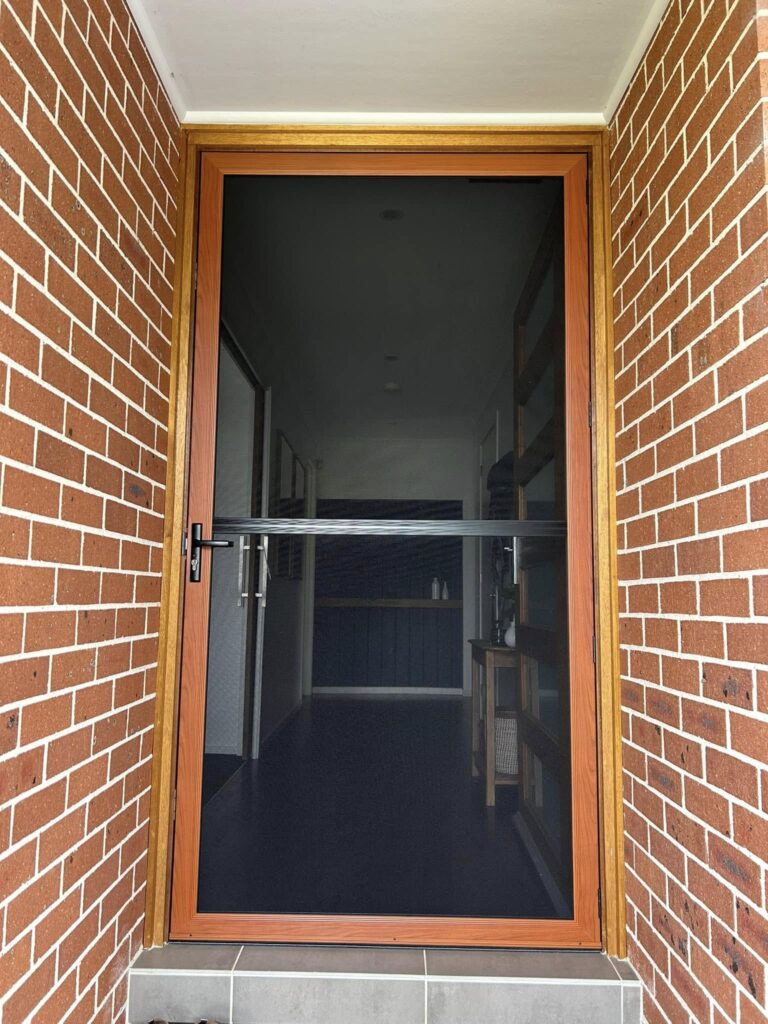 ScreenGuard ScreenGuard security screen door on front entrance installed by Olsen Security