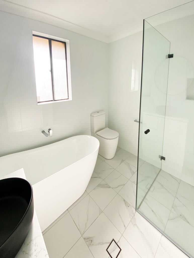 JDS Construction & Design - Sliding window in bathroom installed by Olsen Security