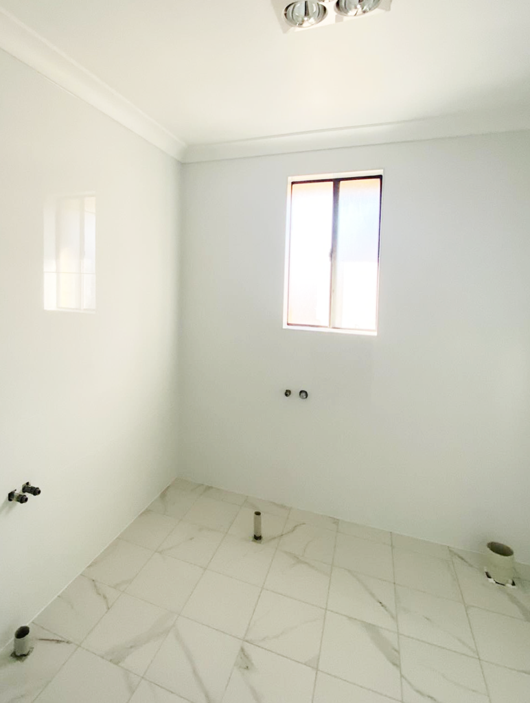 JDS Construction & Design - Sliding window in bathroom installed by Olsen Security