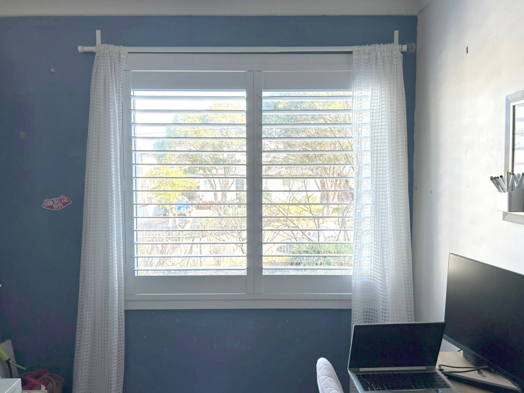 Plantation shutters, blinds, shades & privacy screens Plantation shutters on sliding windows in bedroom installed by Olsen Security