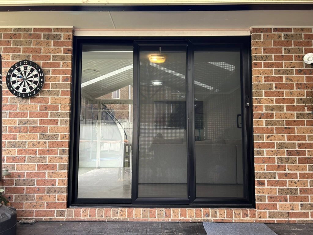 Our Projects ScreenGuard security sliding doors on sliding doors opening to patio installed by Olsen Security