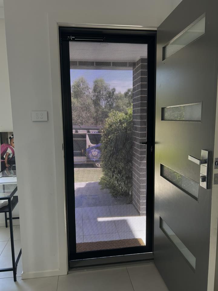 ScreenGuard ScreenGuard security screen door on front entrance installed by Olsen Security