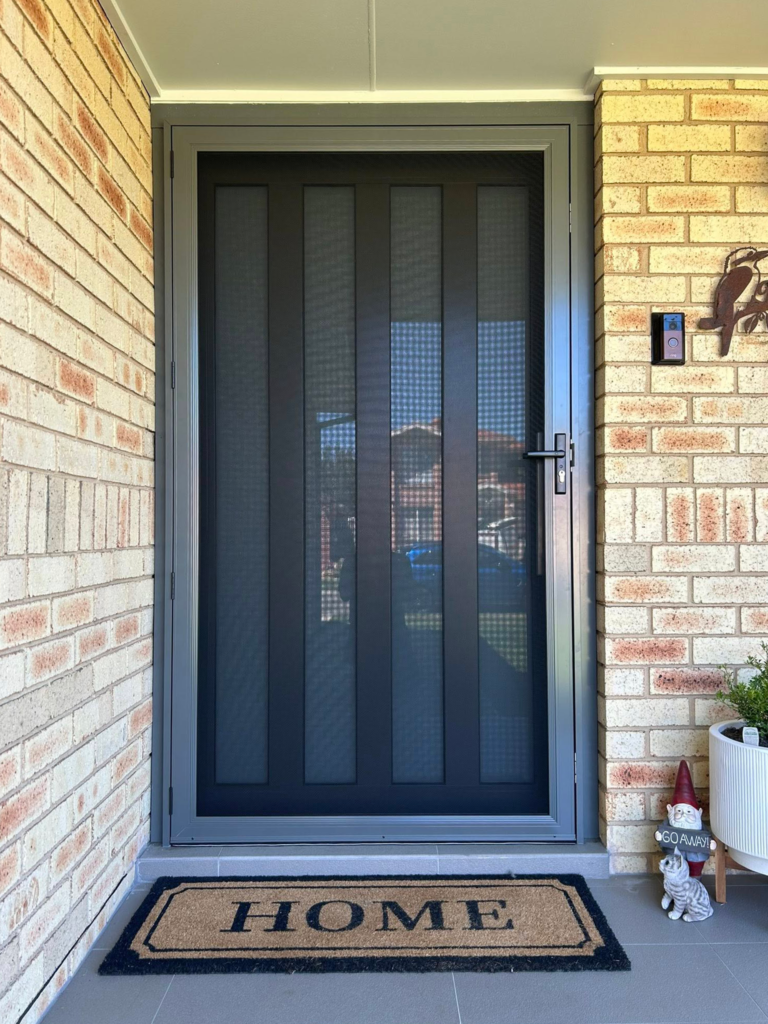 ScreenGuard ScreenGuard security screen door on front entrance installed by Olsen Security