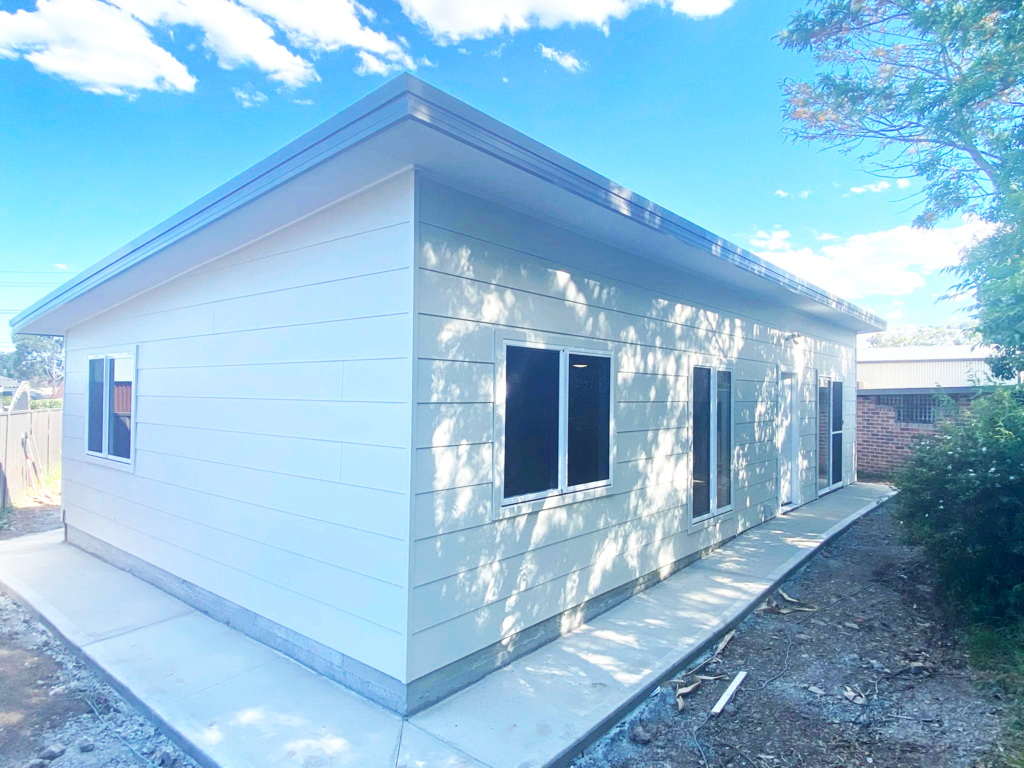 JDS Construction & Design - Flyscreen window on sliding windows, and flyscreen door on sliding doors in granny flat installed by Olsen Security