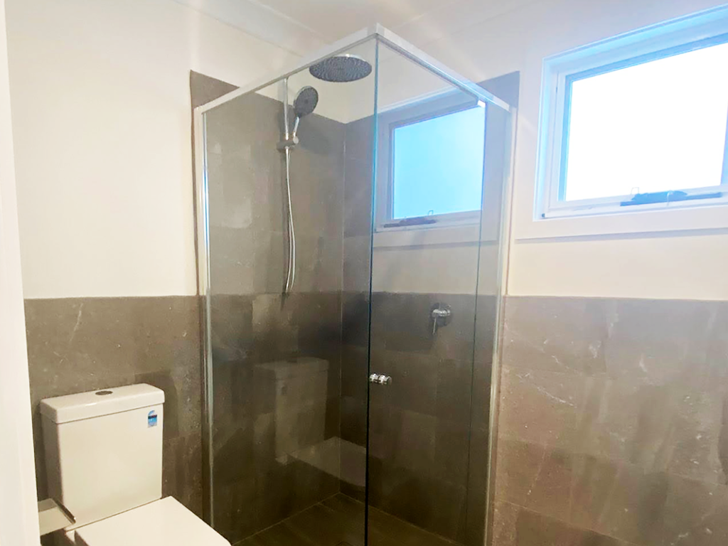 JDS Construction & Design - Awning window in granny flat bathroom installed by Olsen Security