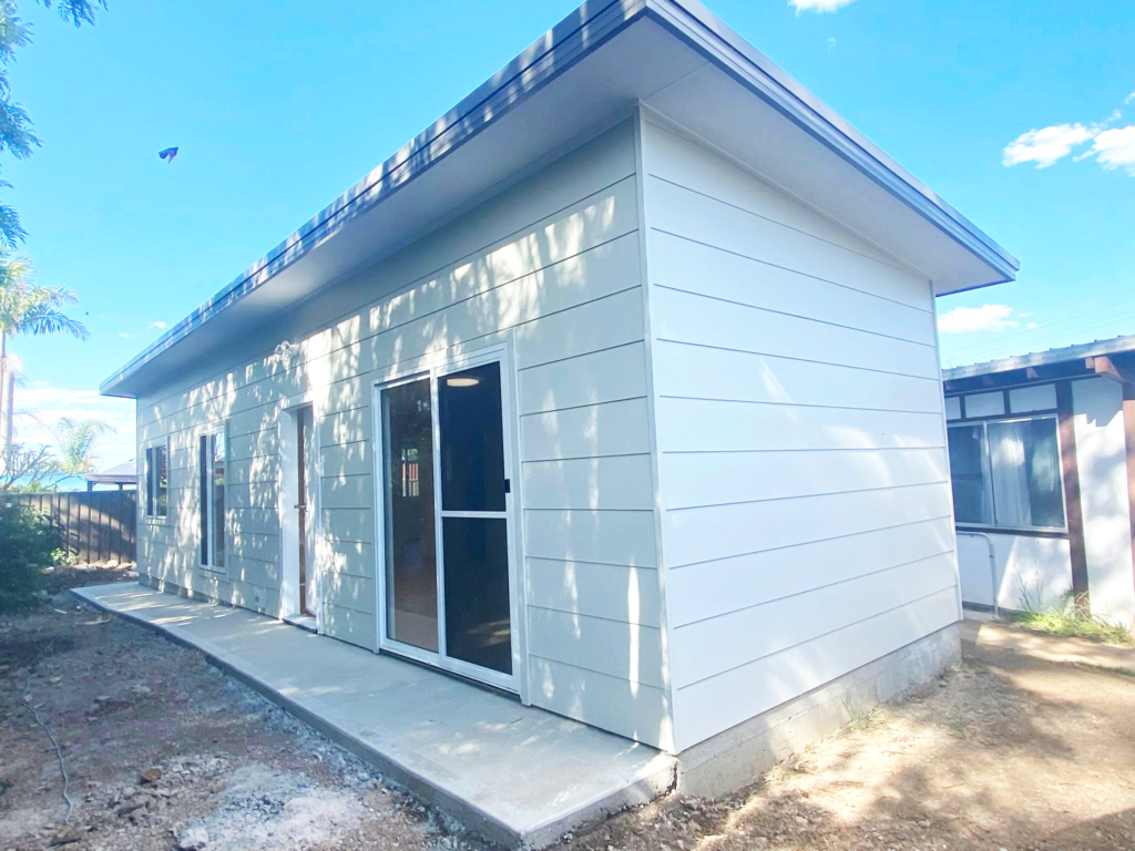 JDS Construction & Design - Flyscreen window on sliding windows, and flyscreen door on sliding doors in granny flat installed by Olsen Security