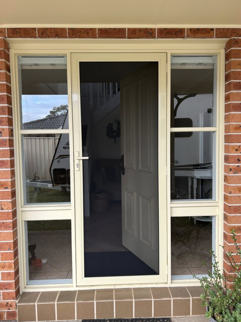 ScreenGuard ScreenGuard security screen door on front entrance installed by Olsen Security