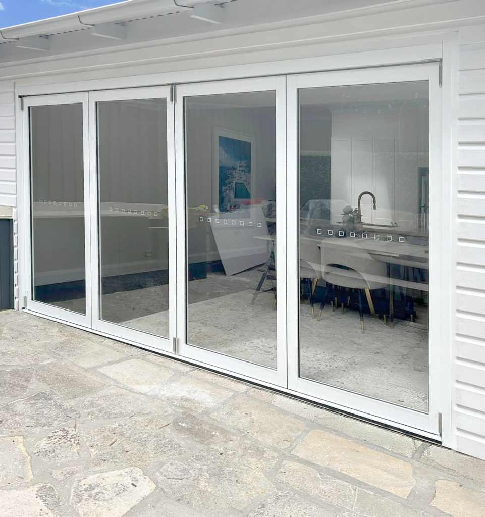 Stacker doors for granny flat installed by Olsen Security