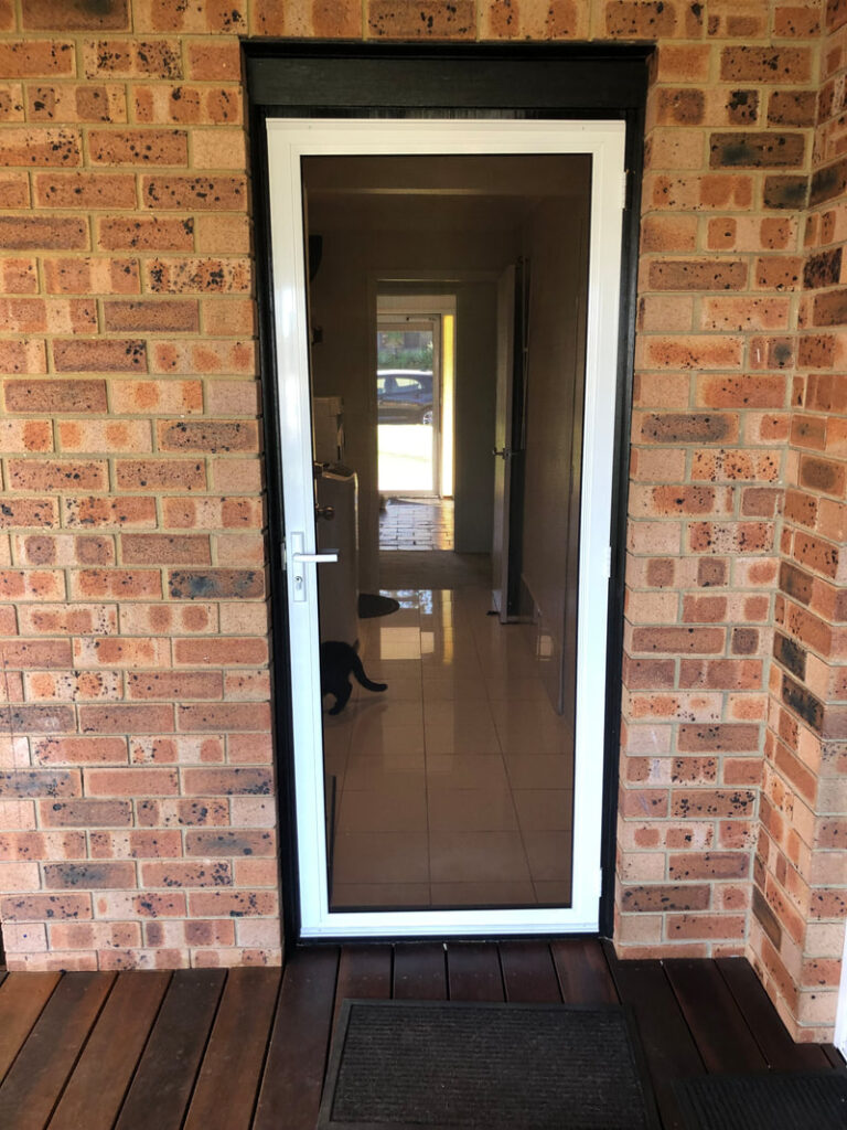 Our Projects Heavy-duty security mesh door on front entrance installed by Olsen Security