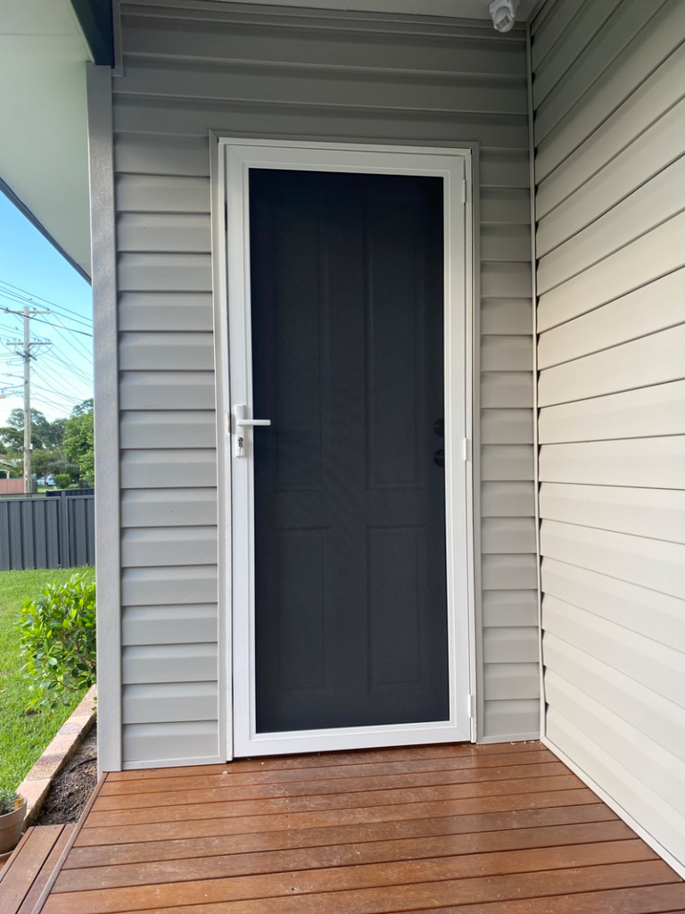 Our Projects Heavy-duty security mesh door on front entrance installed by Olsen Security