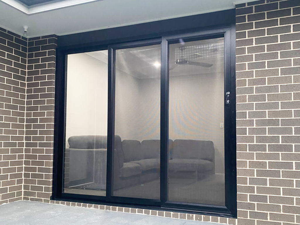 Our Projects ScreenGuard security sliding doors on sliding doors opening to patio installed by Olsen Security