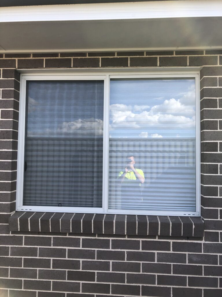 Flyscreen on sliding window installed by Olsen Security