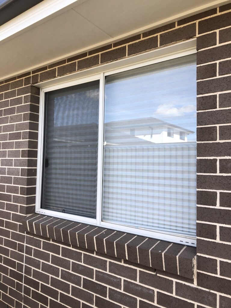 Flyscreen on sliding window installed by Olsen Security