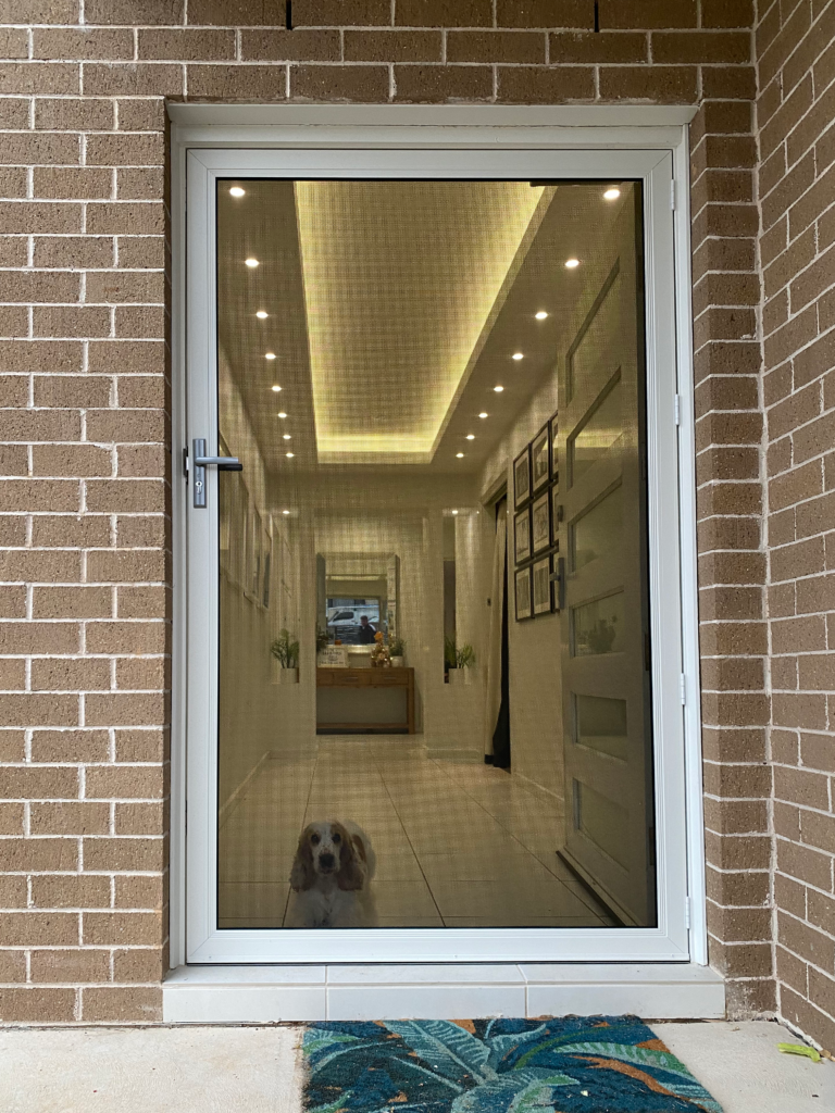 ScreenGuard ScreenGuard security screen door on front entrance installed by Olsen Security