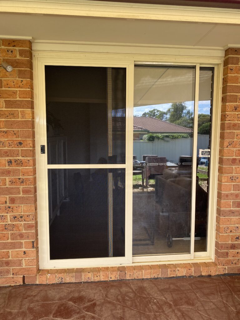 Flyscreen sliding door on sliding door installed by Olsen Security