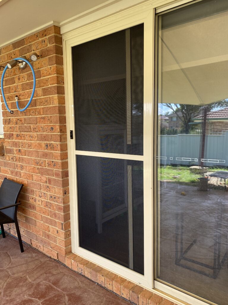 Flyscreen sliding door on sliding door installed by Olsen Security