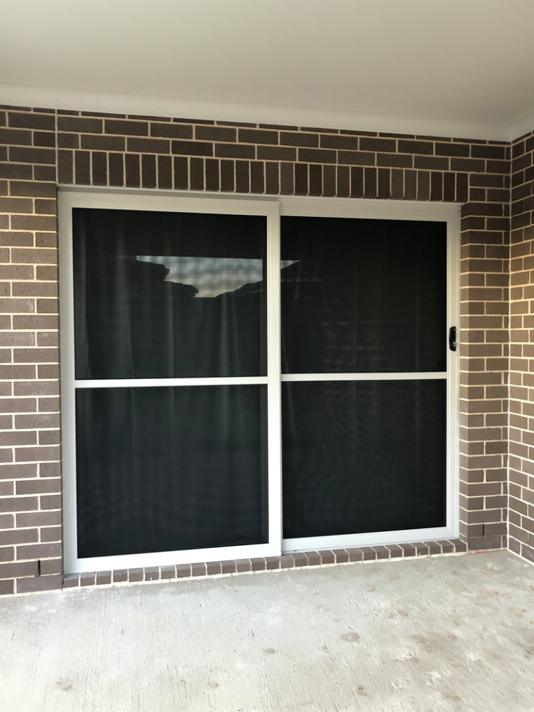ScreenGuard ScreenGuard security sliding door on sliding door opening to outdoor area installed by Olsen Security