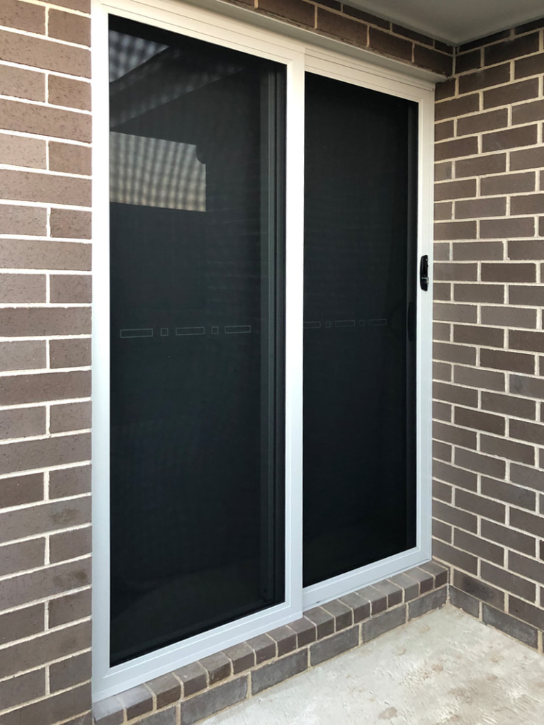 ScreenGuard ScreenGuard security sliding door on sliding door opening to outdoor area installed by Olsen Security