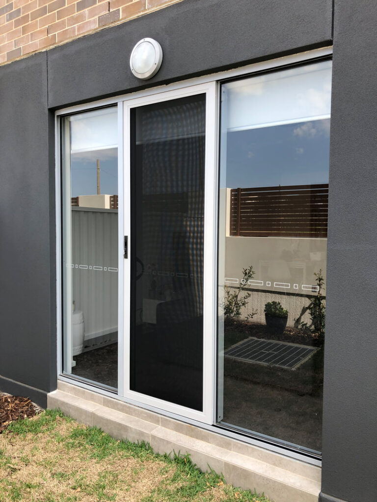 ScreenGuard ScreenGuard security sliding door on sliding door opening to outdoor area installed by Olsen Security