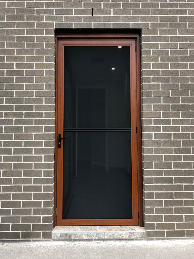 ScreenGuard ScreenGuard security screen door on front entrance installed by Olsen Security